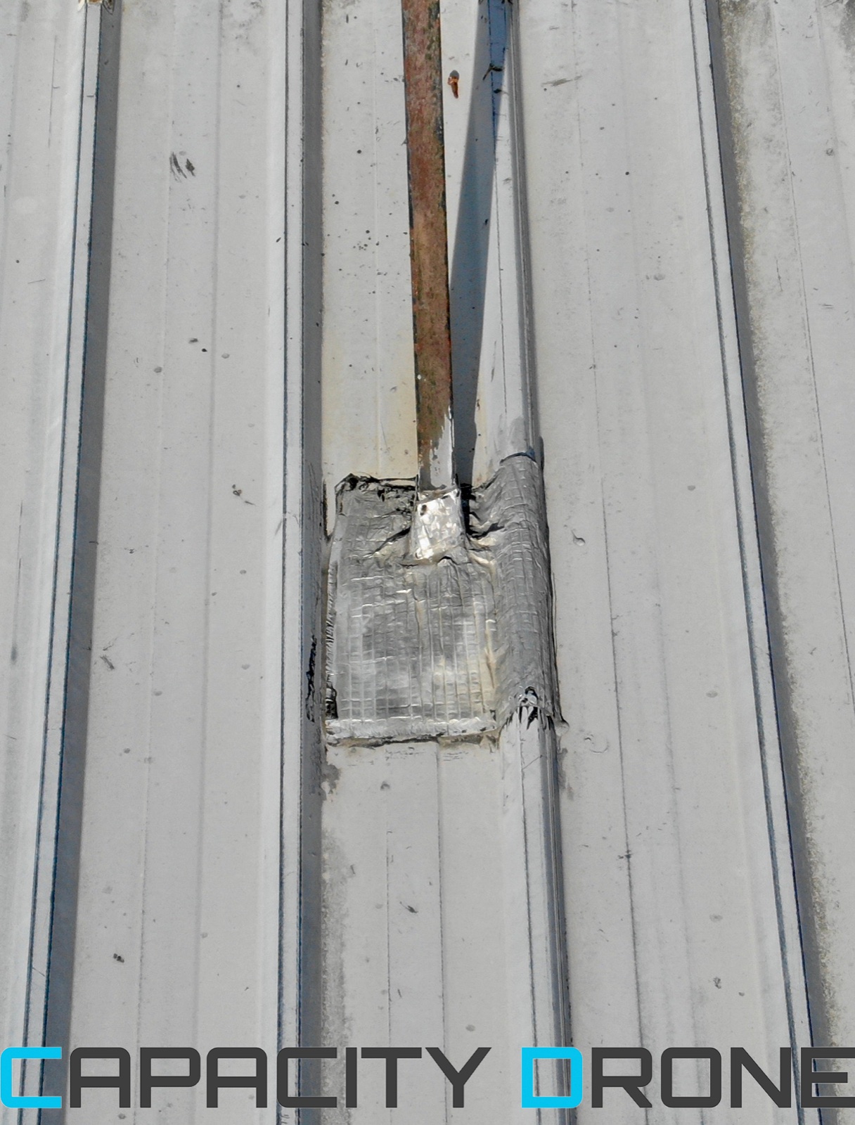 Dommages toiture drone assurance